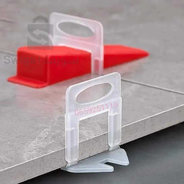 Leveling floor tiles