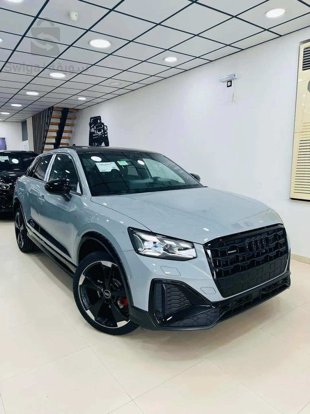 AUDI        Q 2