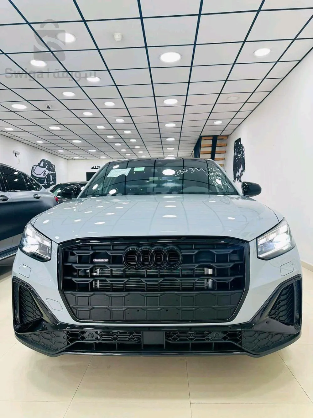 AUDI        Q 2