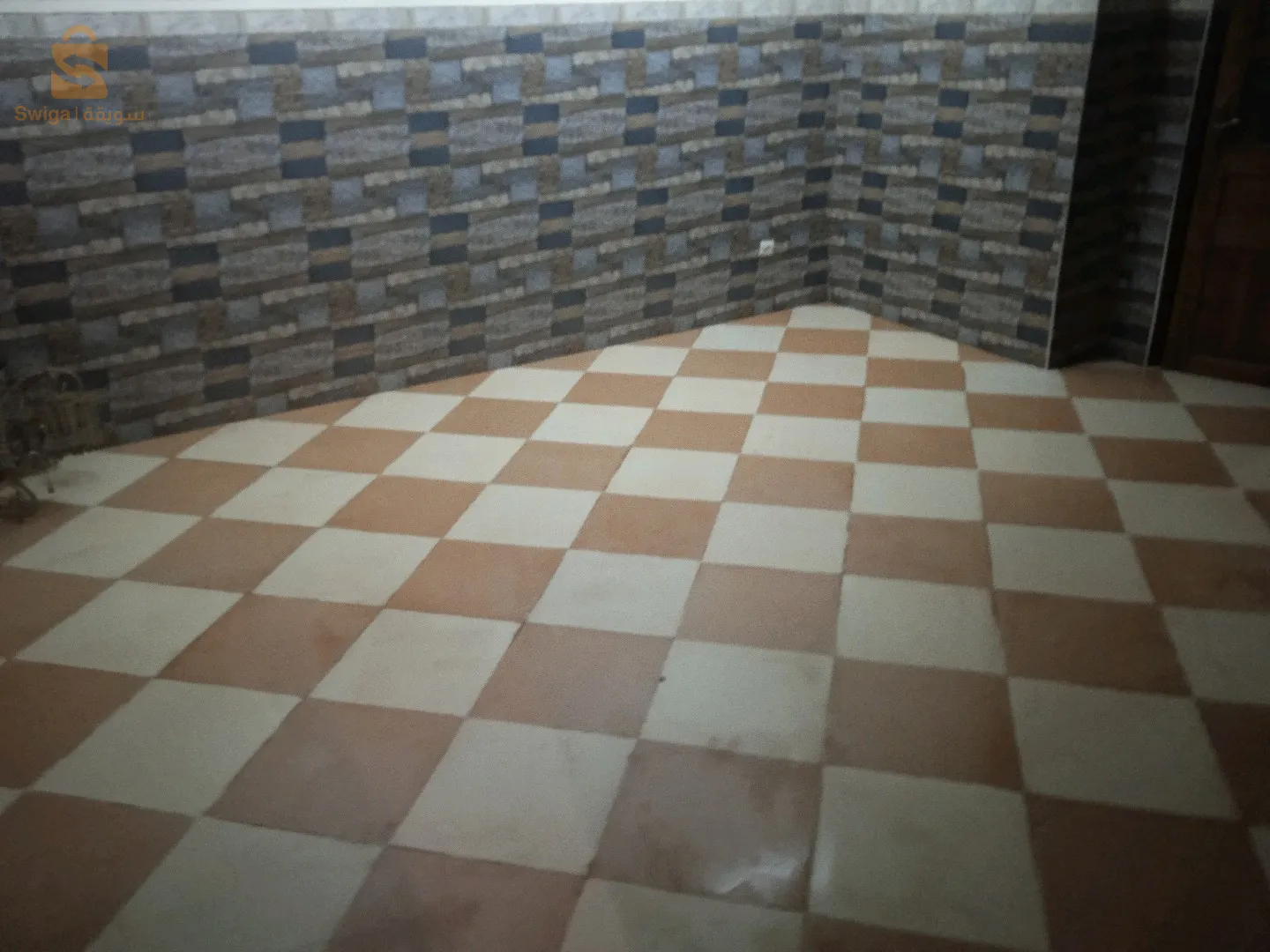 حي 200مسكن تساهمي سيدي عيسى