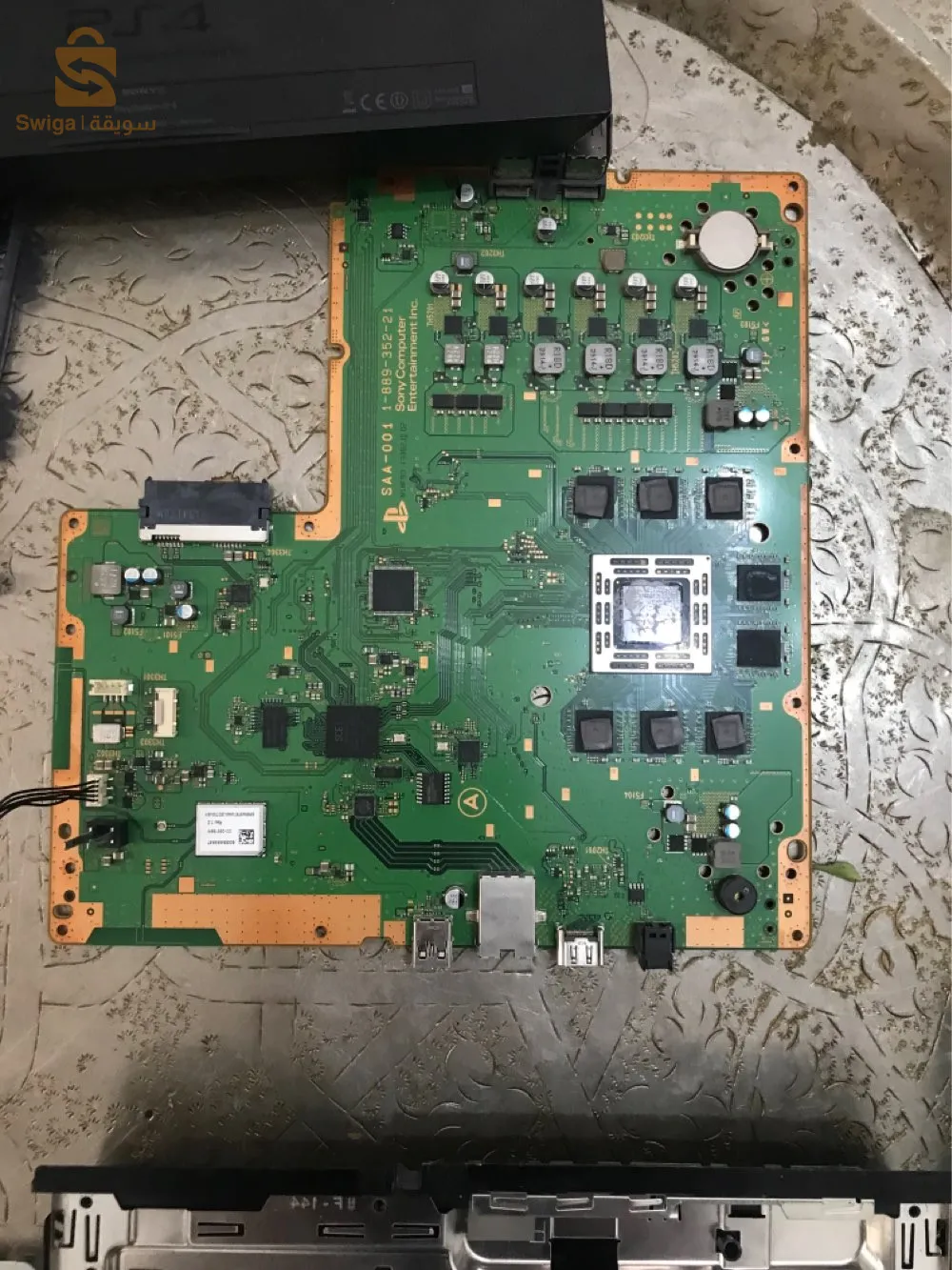 changement de la pâte thermique pour ps4  + de nettoyage