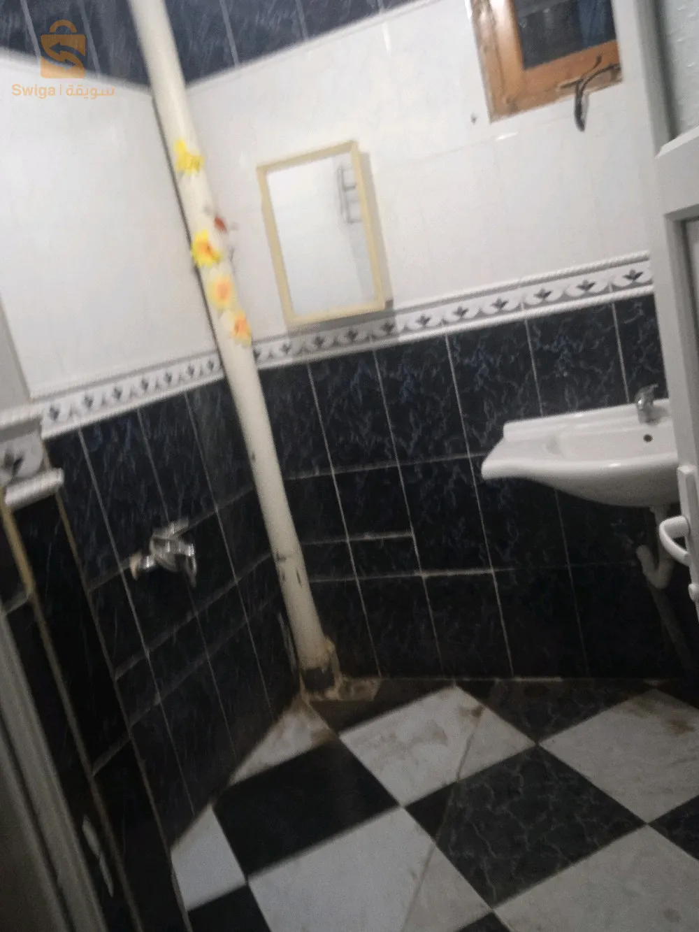 حي 200مسكن تساهمي سيدي عيسى