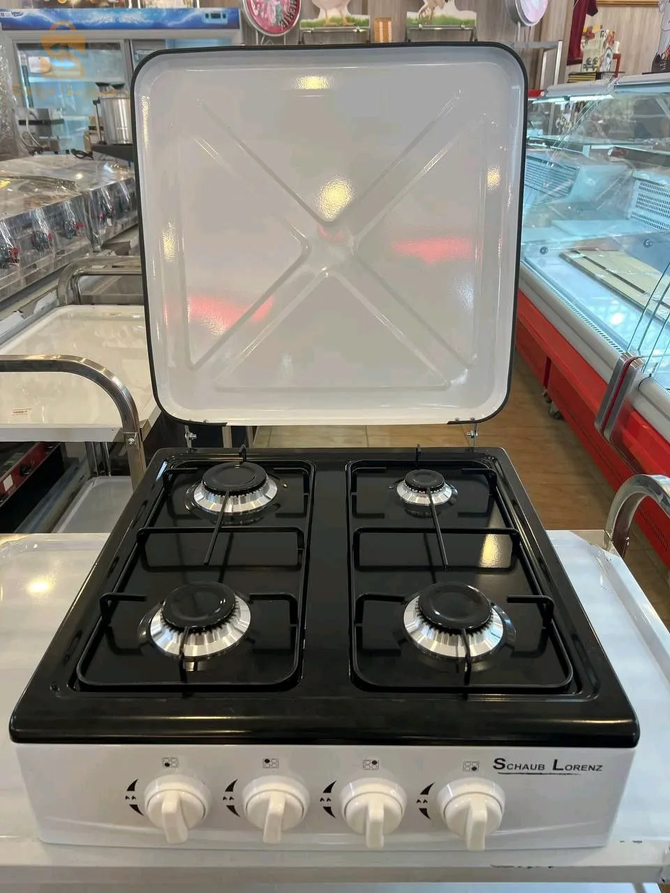 Four gaz 4 feux schaub lorenz موقد غاز