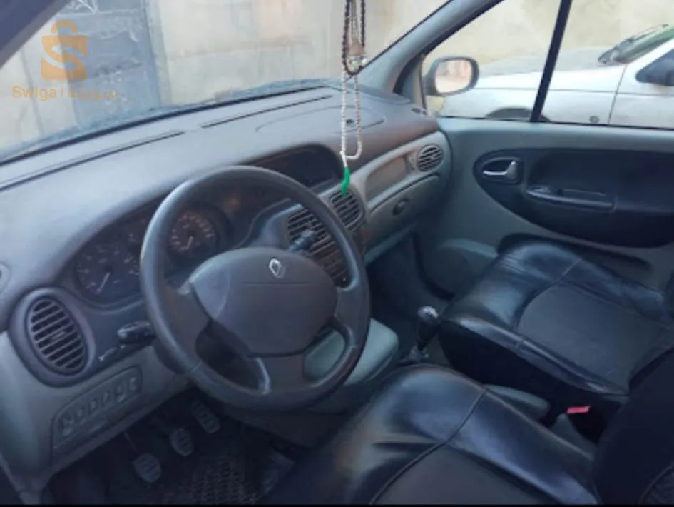 Scénic 1.9 dci est bleu