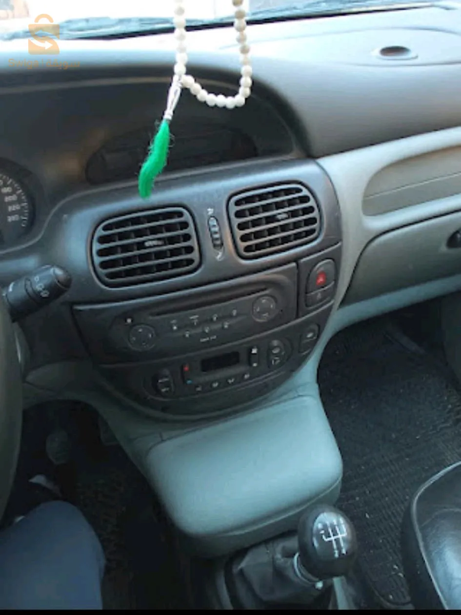 Scénic 1.9 dci est bleu