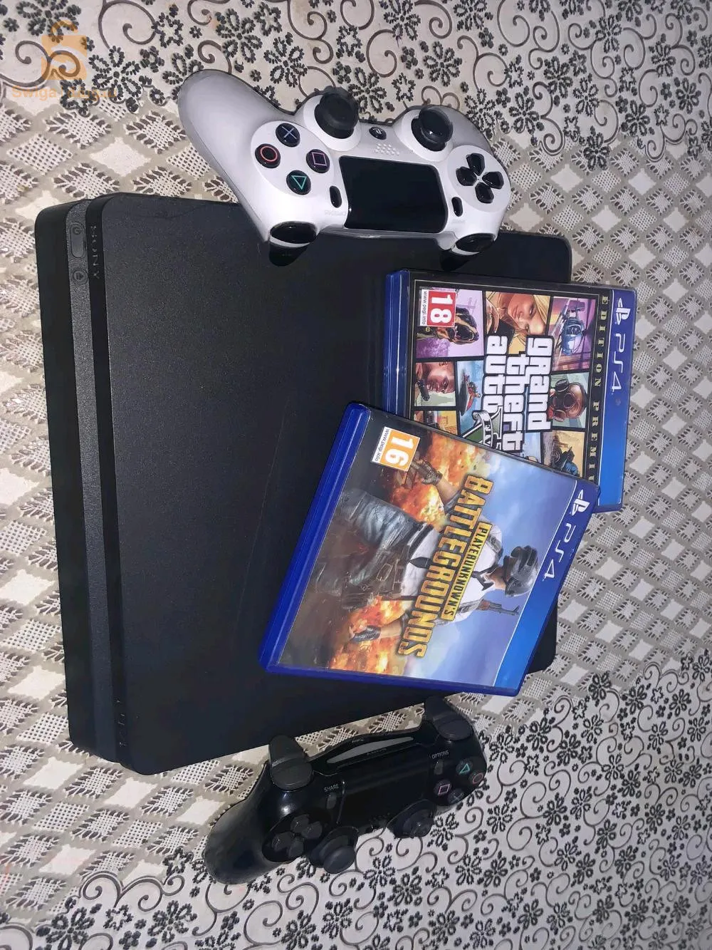 PS4 slim 500gb 2 mannette original v2 cd GTA 5 PUBG Jamais tft7 بلاي ستيشن 4