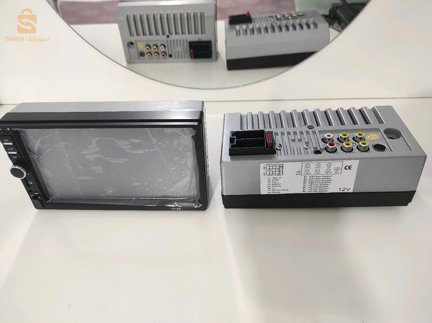 Autoradio DVD mp5 player (Référence 7018B marque acodo) made in chine