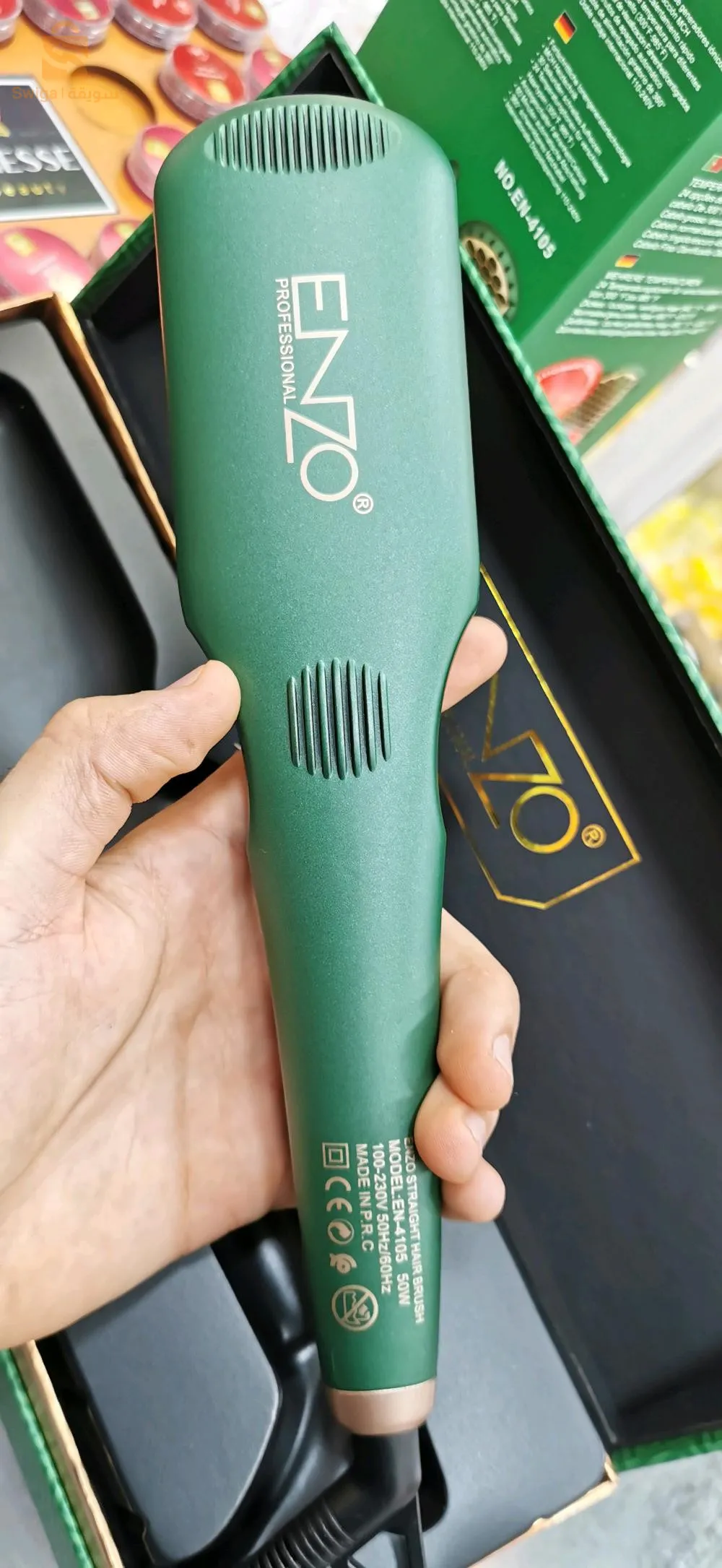 Brosse chauffante lissante