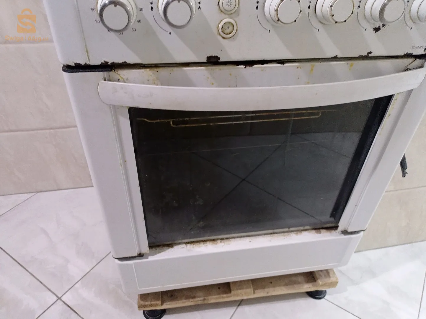 cuisinière 4 feux géant