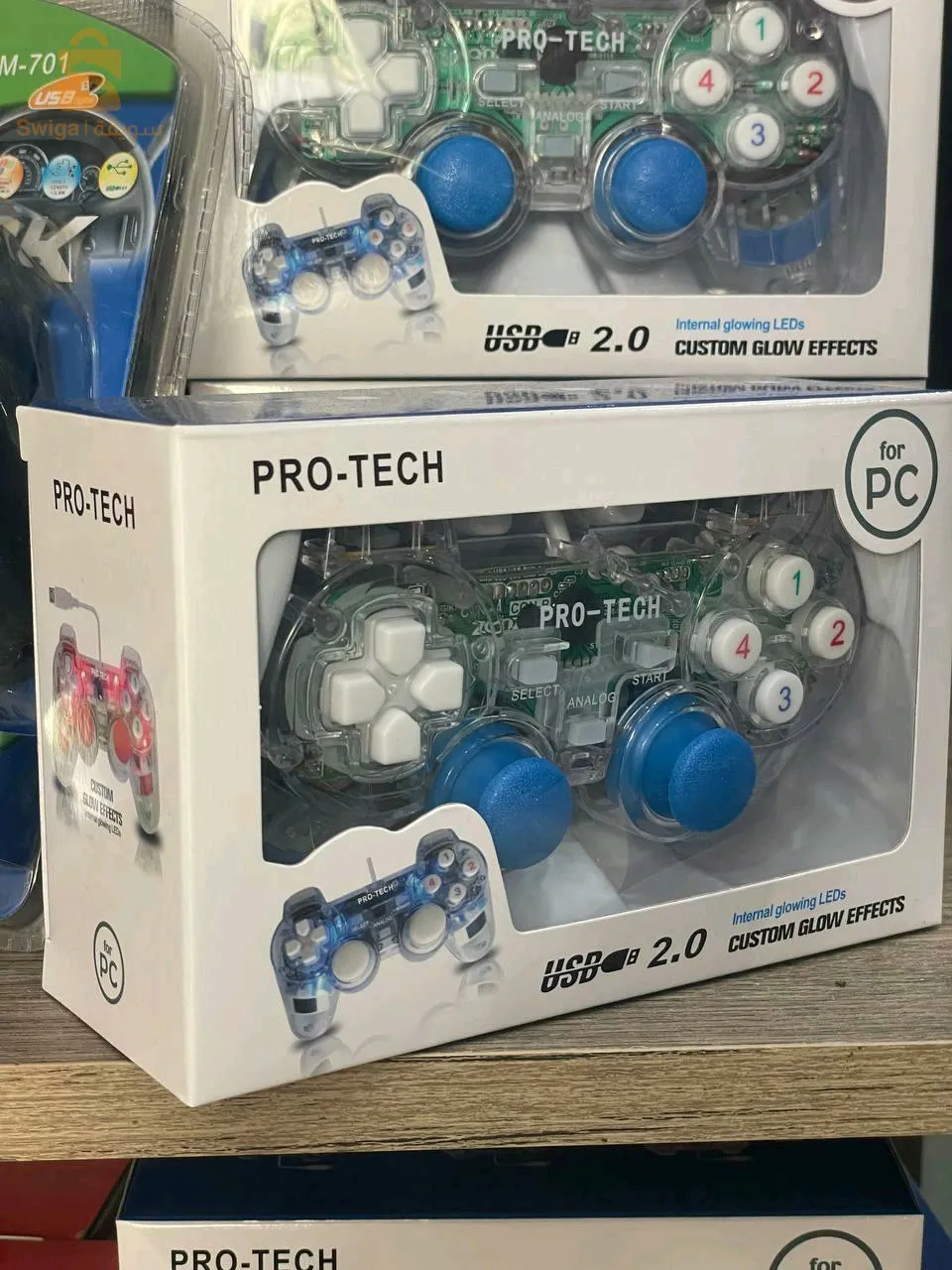 جهاز التحكم في ألعاب الفيديو للحاسوب للإستمتاع بألعابك Manette Vibrante Transparente Pro-Tech 702‎