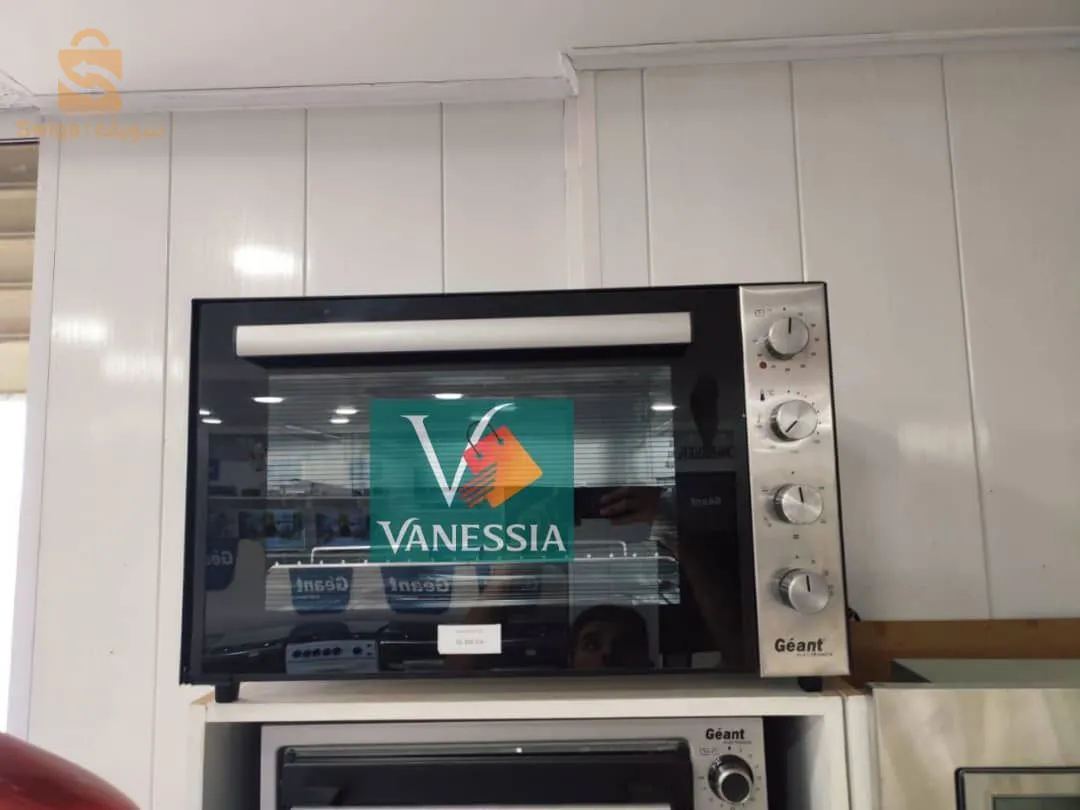 Four GEANT 70L garantie 12 mois  ✅ ventiler 
✅ Inox / Noir
✅ Tourne broche (تحمر الجاج )
✅Capacité : 70L
✅dimension (L.H.P mm) 640x380x490mm
✅ S'allume en haut et en bas au meme temps
🟢 Prix 21000 da 
🟢 توصيل مجاني فالعاصمة و 500 دج في بومرداس تيبازة بليدة و 600 دج في باقي الولايات لباب المنزل و الدفع عند الاستلام 😍
🔵 عمولة المنتج 800 دج ❤️🎁