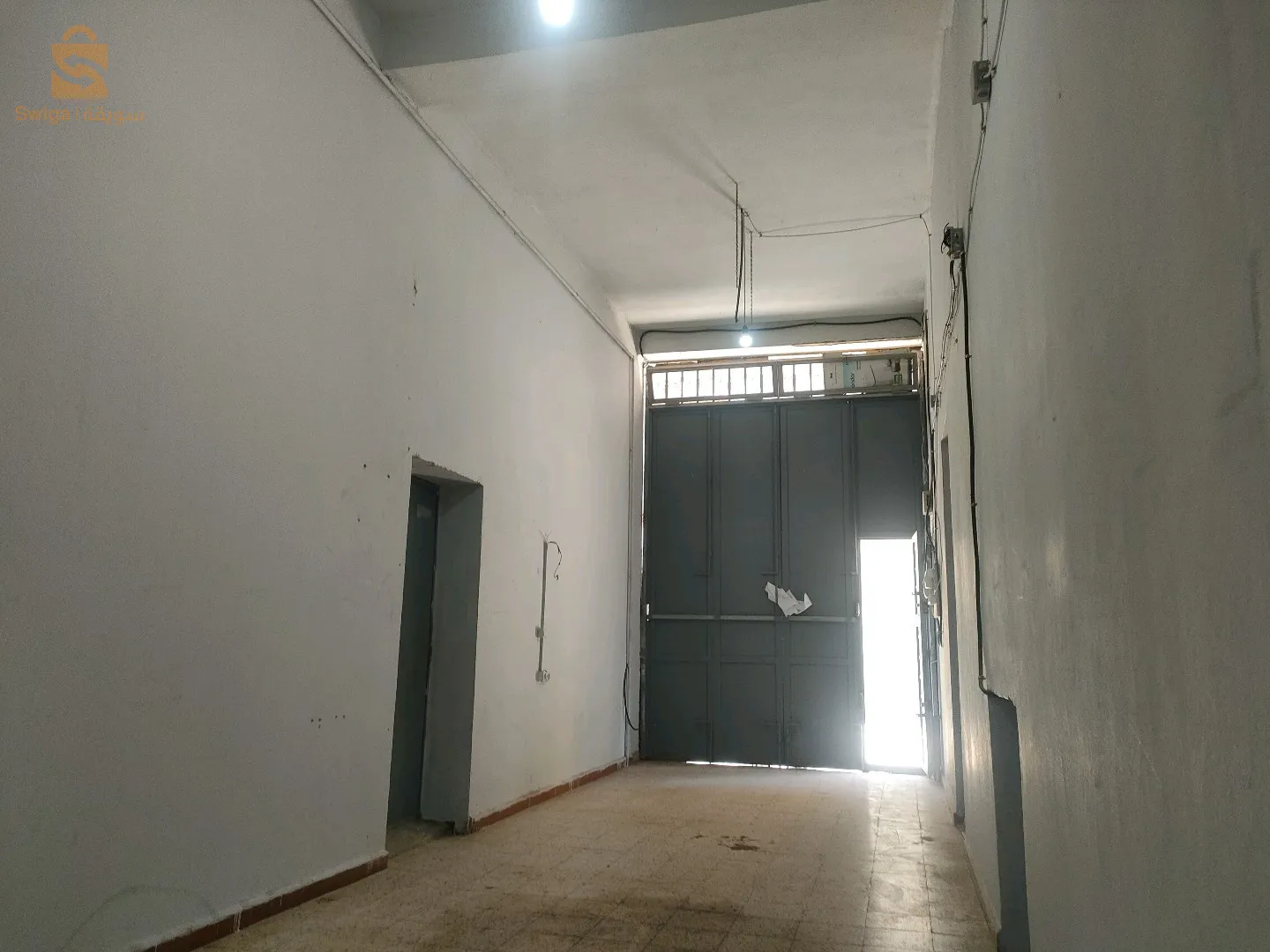 حي المندرين بجانب محلات للتيكنو