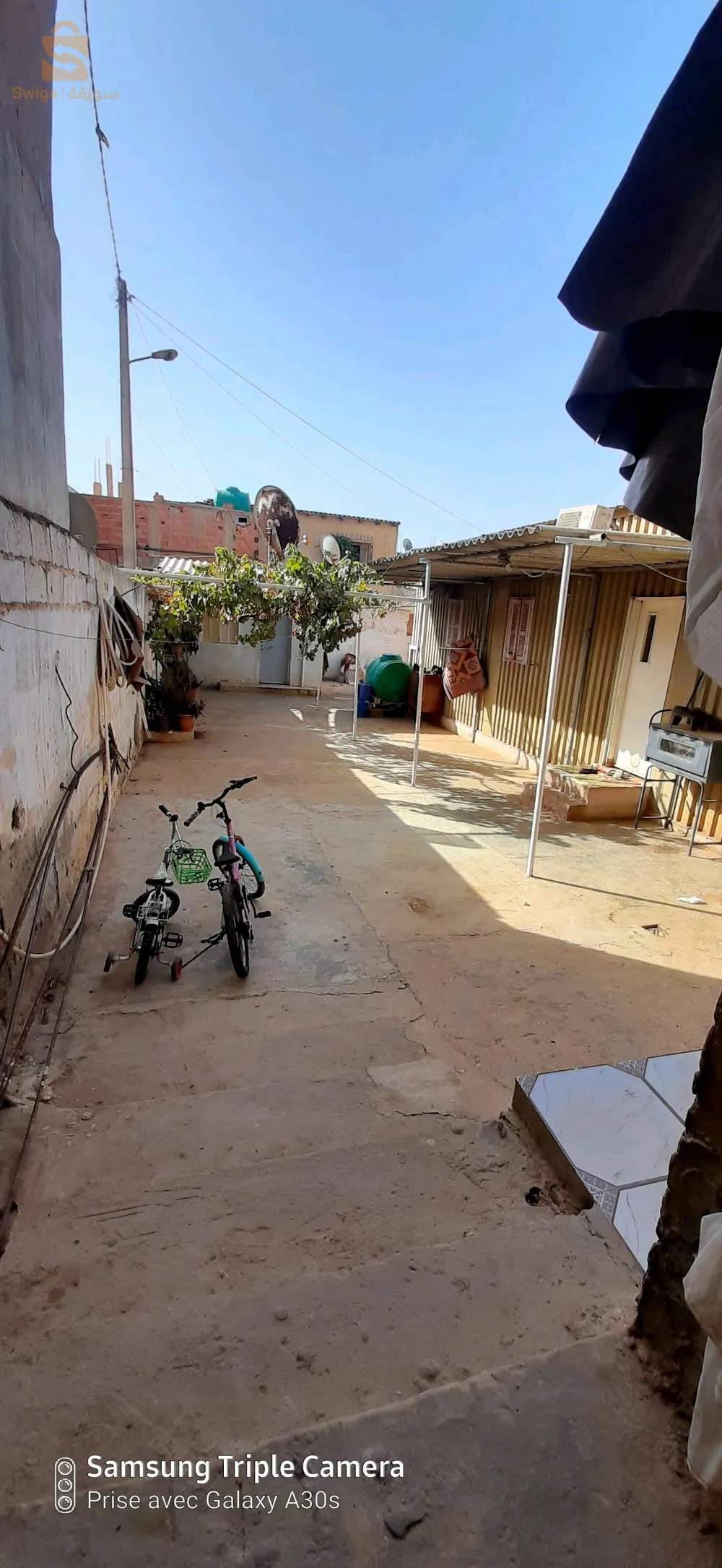 3محلات تجارية +بنيان+براكة مساحة اجمالية 362.40م