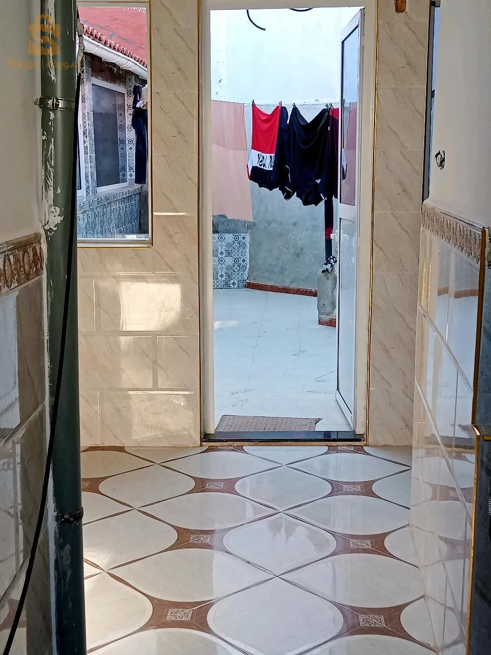 من ل للبيع يتكون من منزلين بمساحة 316 م² بعقد ملكية ببوإسماعيل أمام البلدية الجديدة