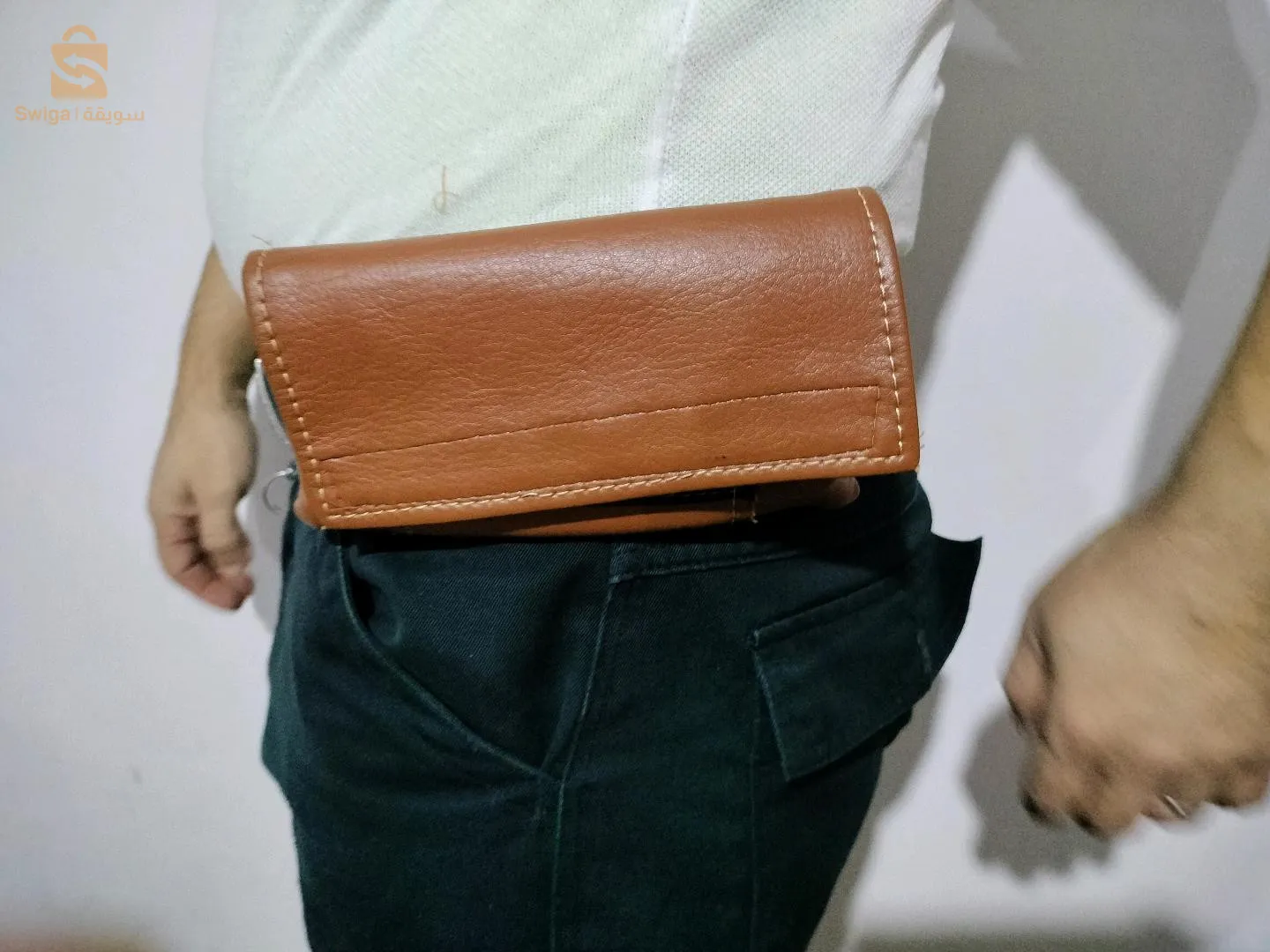 حامل الهاتف النقال في الحزام لكل انواع الهواتف المحمولة الجديدة يسهل ويساعد في حمل الهاتف النقال علامة #mark l'homme libre#0542664767