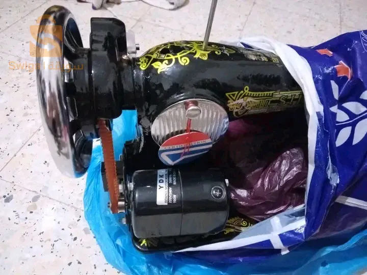 الة خياطة ملابس