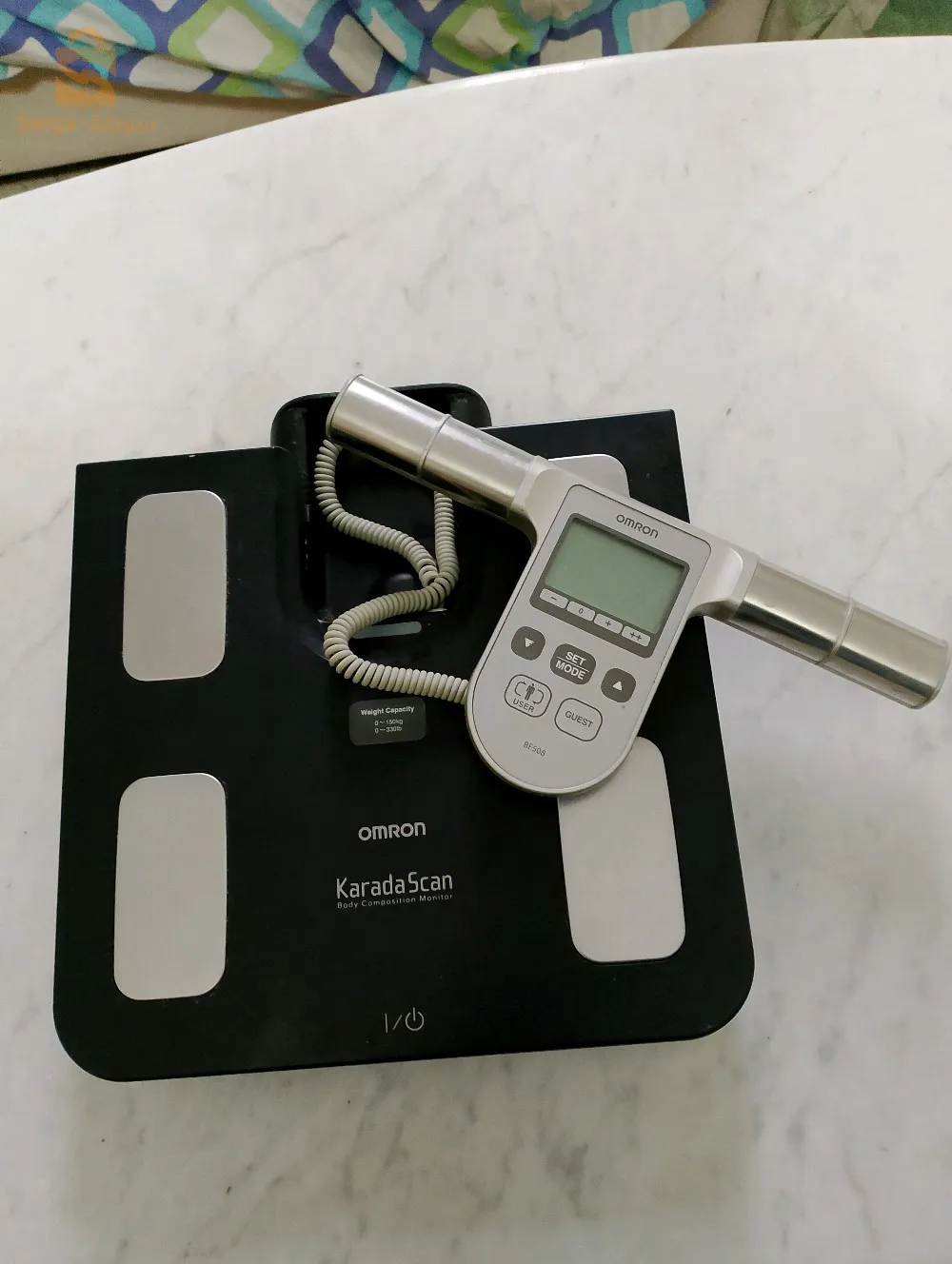 pèse personne omron avec calculateur de la masse graisseuse