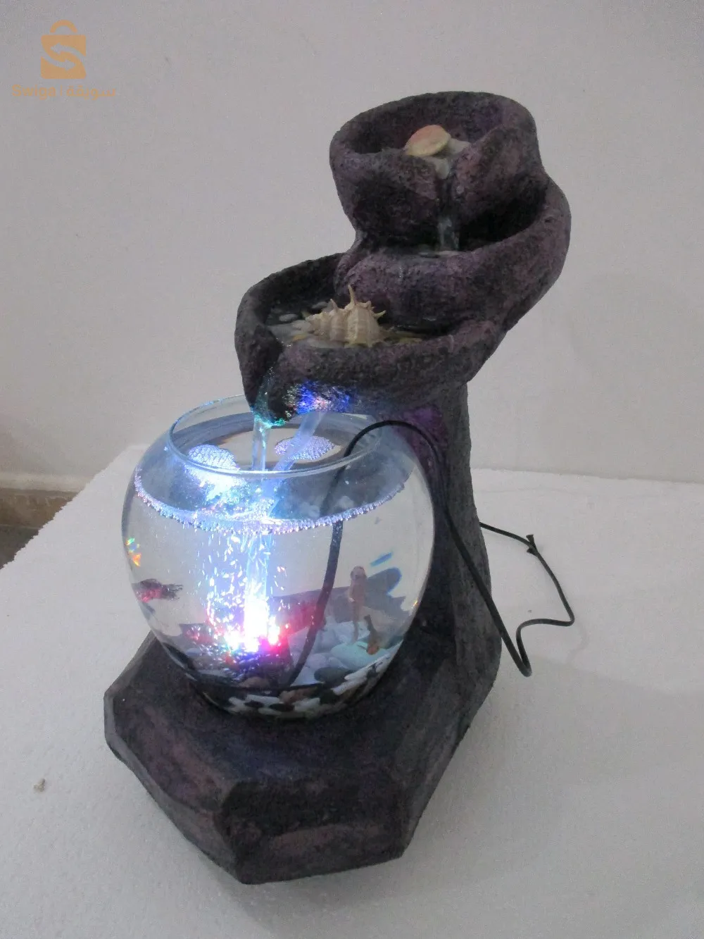 نافورة  وحوض سمك