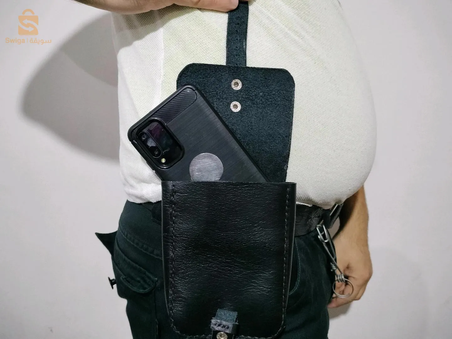 حامل الهاتف النقال في الحزام لكل انواع الهواتف المحمولة الجديدة يسهل ويساعد في حمل الهاتف النقال علامة #mark l'homme libre#0542664767
