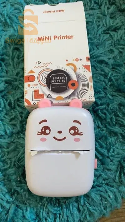 طابعة حرارية بدون حبر  يستعملها طلاب خفيفة الوزن. صغيرة الحجم السعر لن تجده في سوق