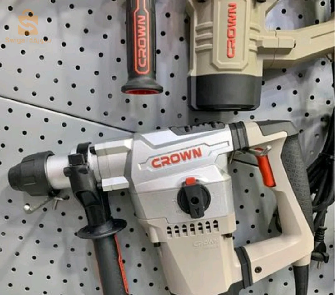 visseuse crown marteau perforateur.  niveau laser. et perché