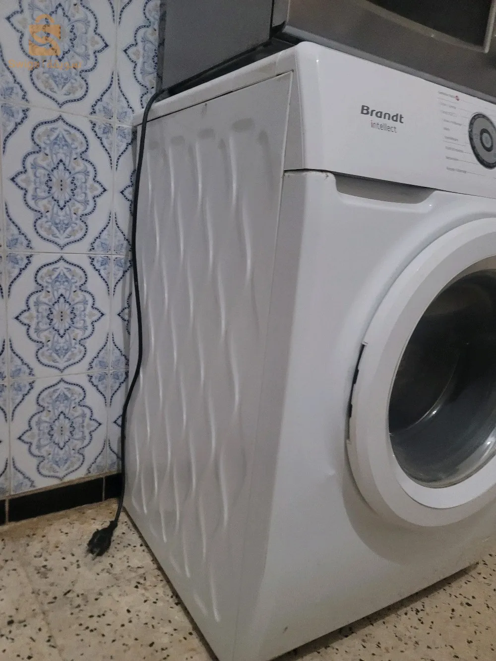 اله غسيل بروند 7 كيلو اوتوماتيك تغسل تشلل تنشف وتحمي الماء 10 على 10