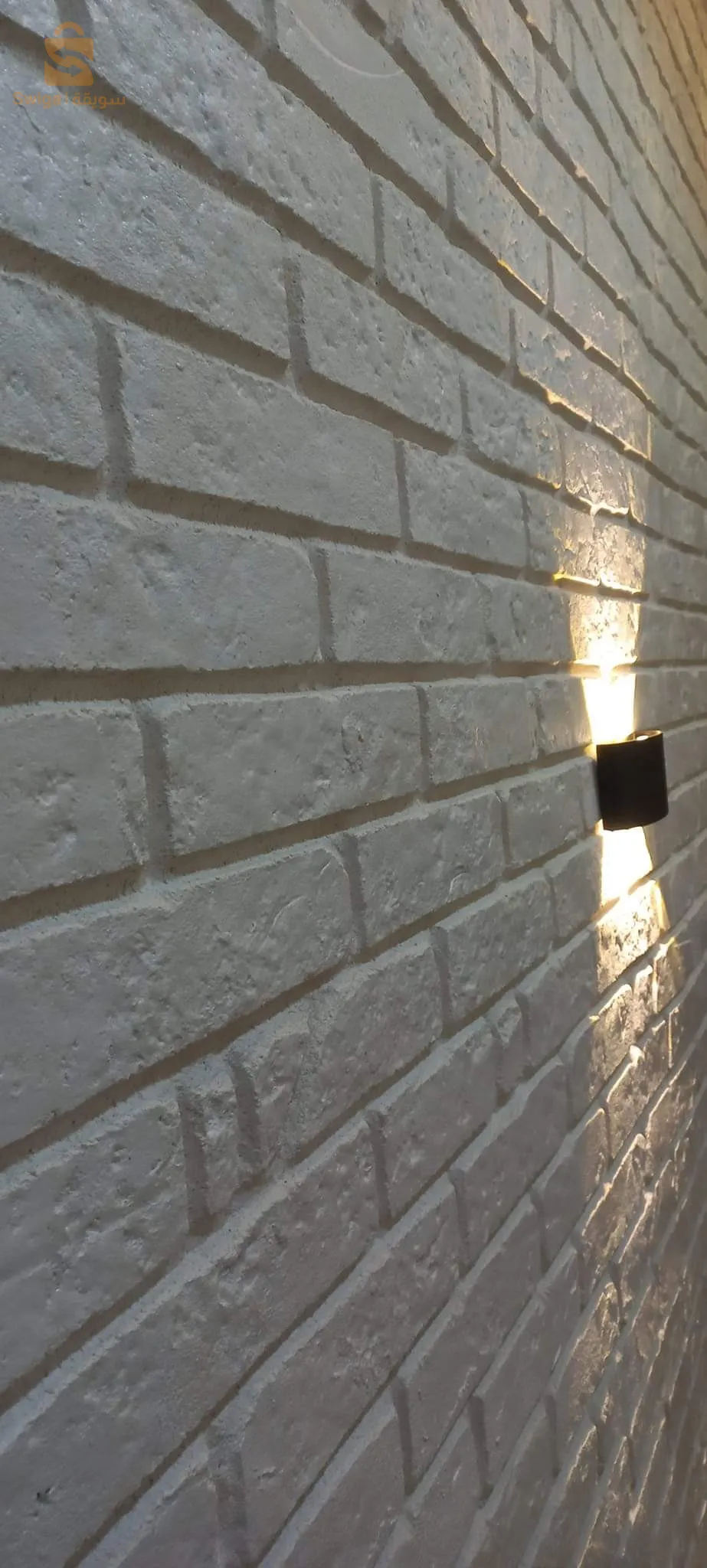 fausse brique sculptée