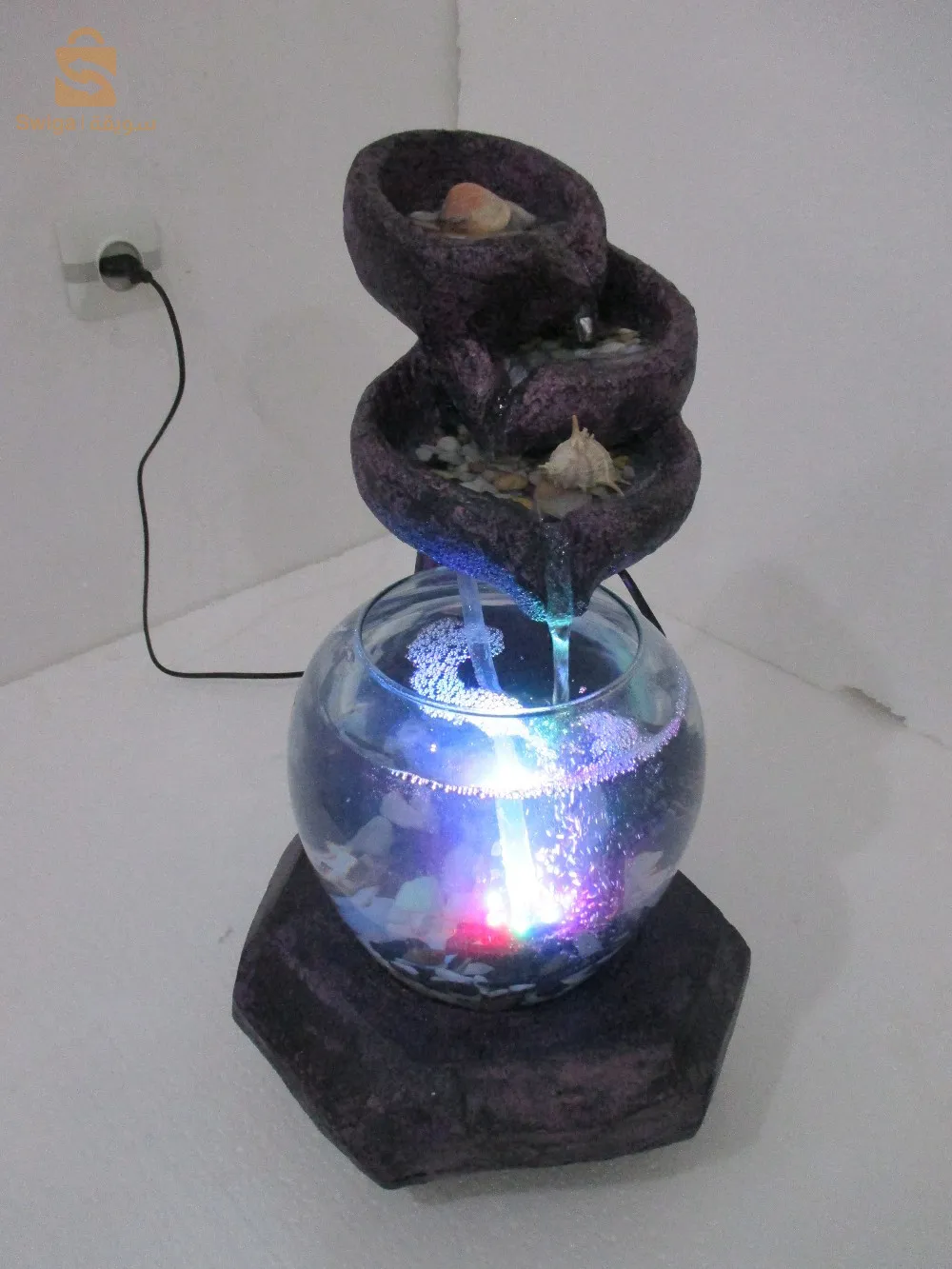 نافورة  وحوض سمك