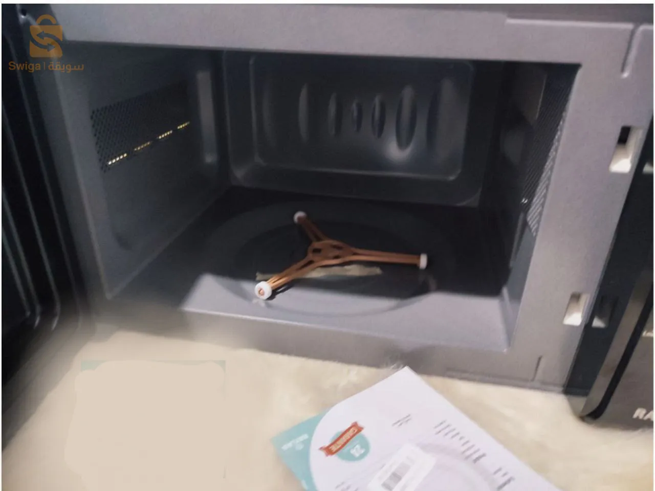 فرن ميكروويف من رايلان لتسخين وطهي سريع