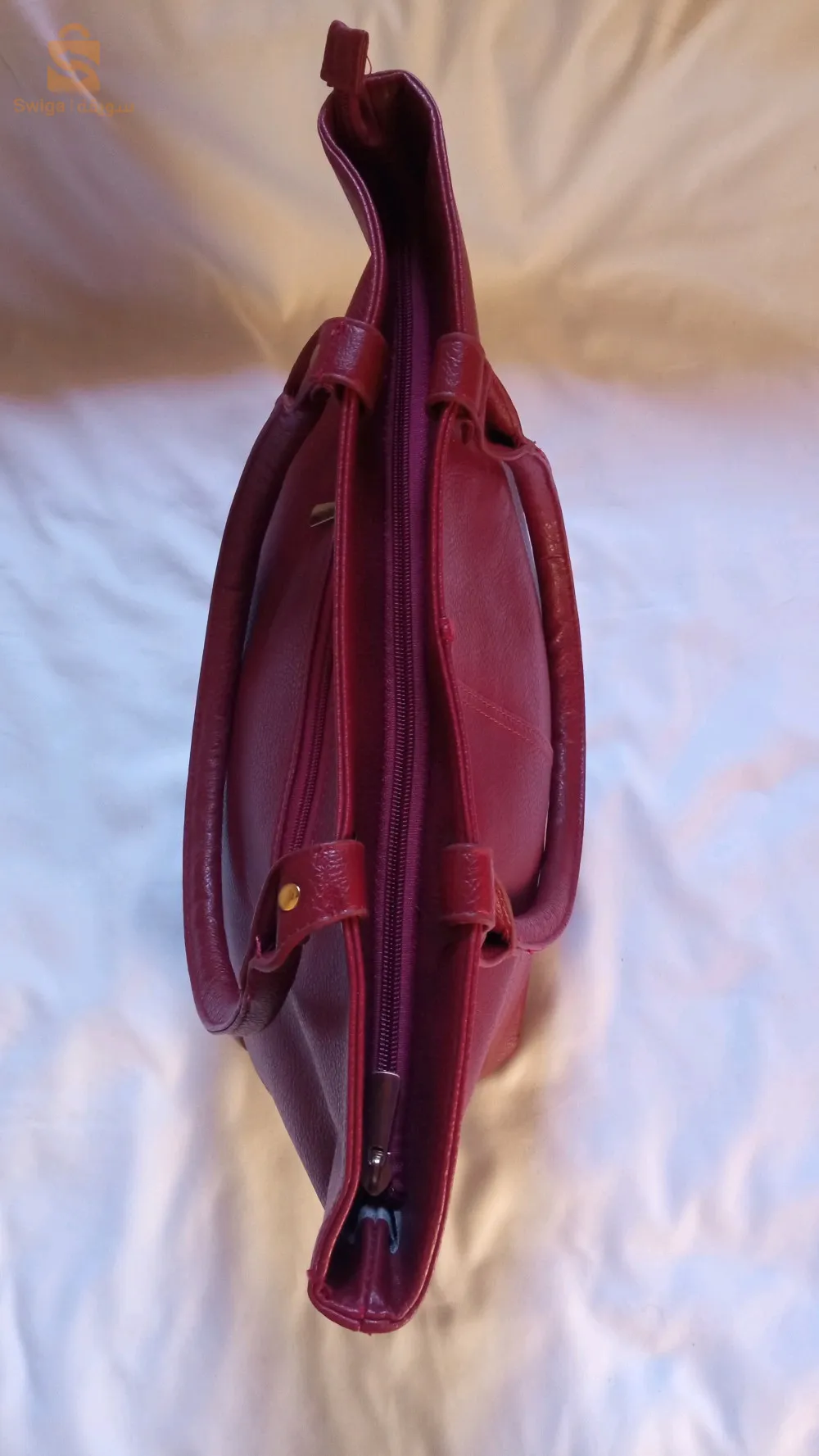 sac grenat tvrais  cuir🇪🇦 neuf ( la boucle ta3 la poche intérieure mksra )