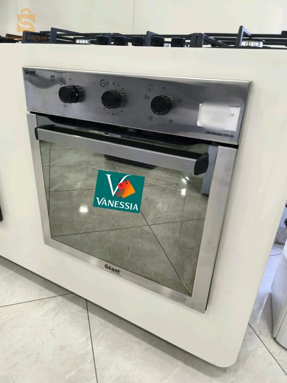 Four encastrable géant miroir inox