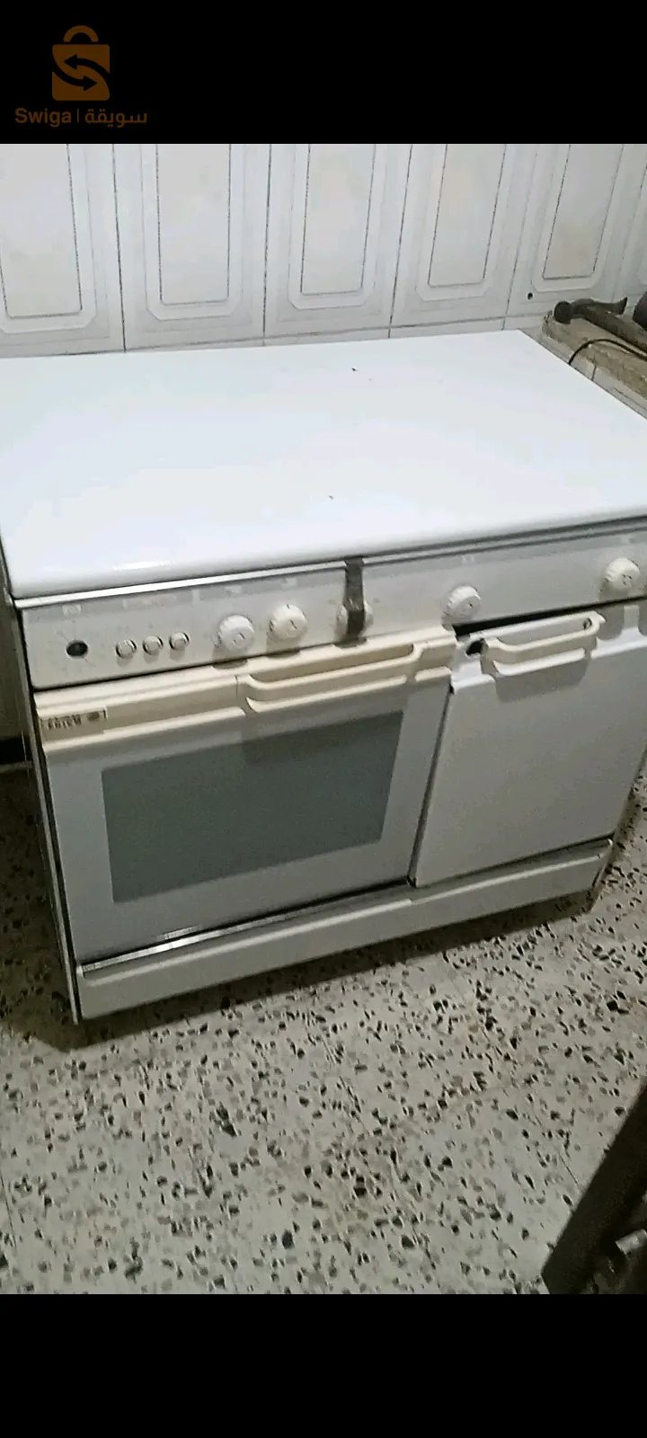 cuisinière.marque.'ENIEME قديمة شوية كولش فيها يمشي