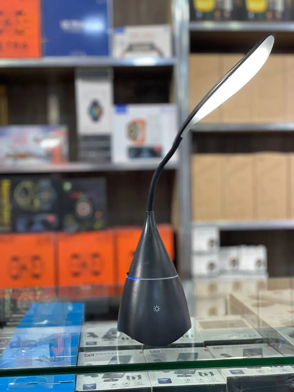 Desk lamp and speaker