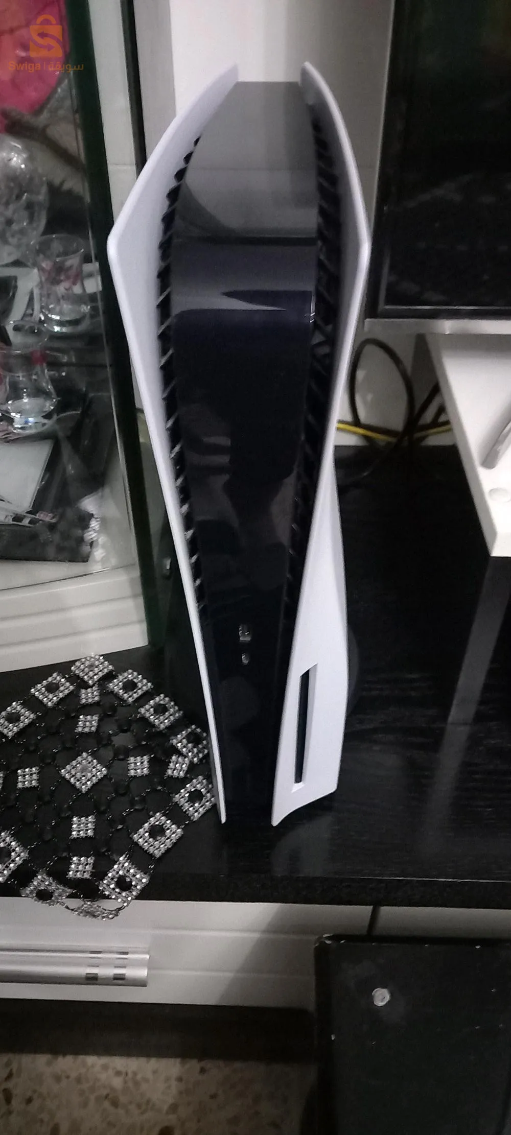 ps5 jdid utilise 2 mois avec 2 manet et station de charge