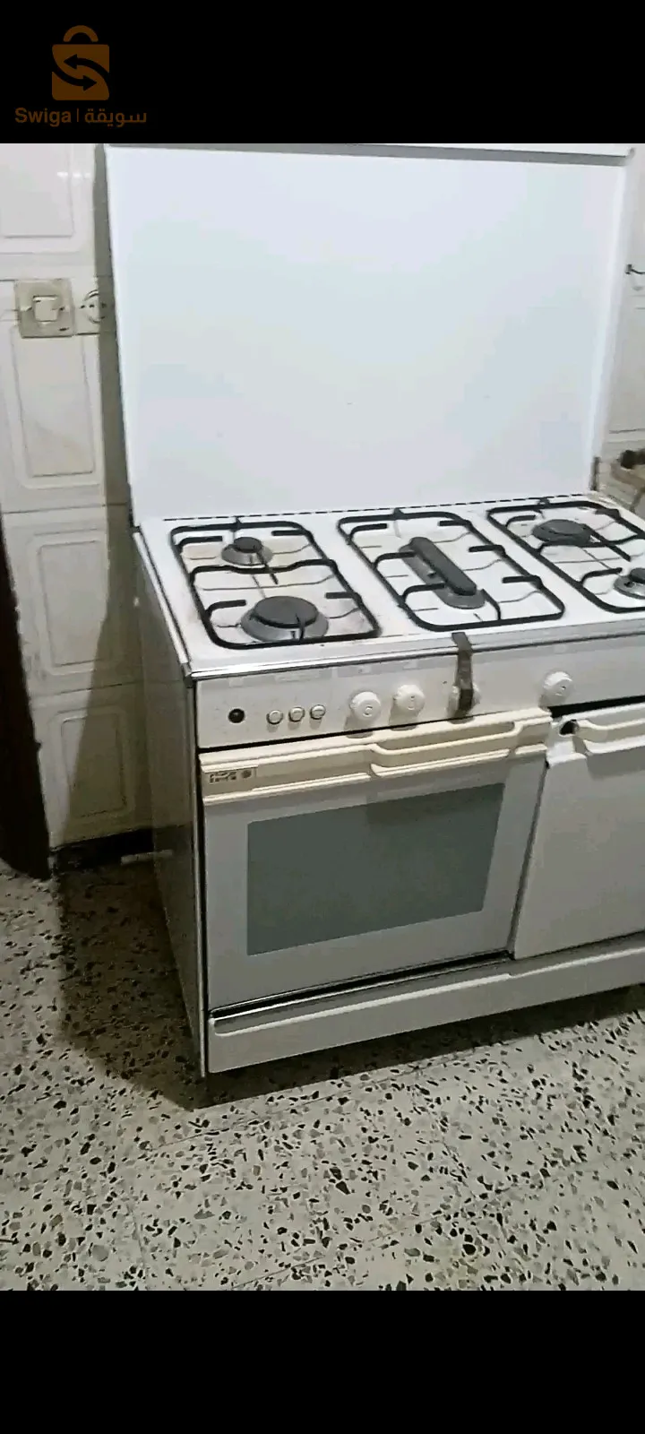 cuisinière.marque.'ENIEME قديمة شوية كولش فيها يمشي
