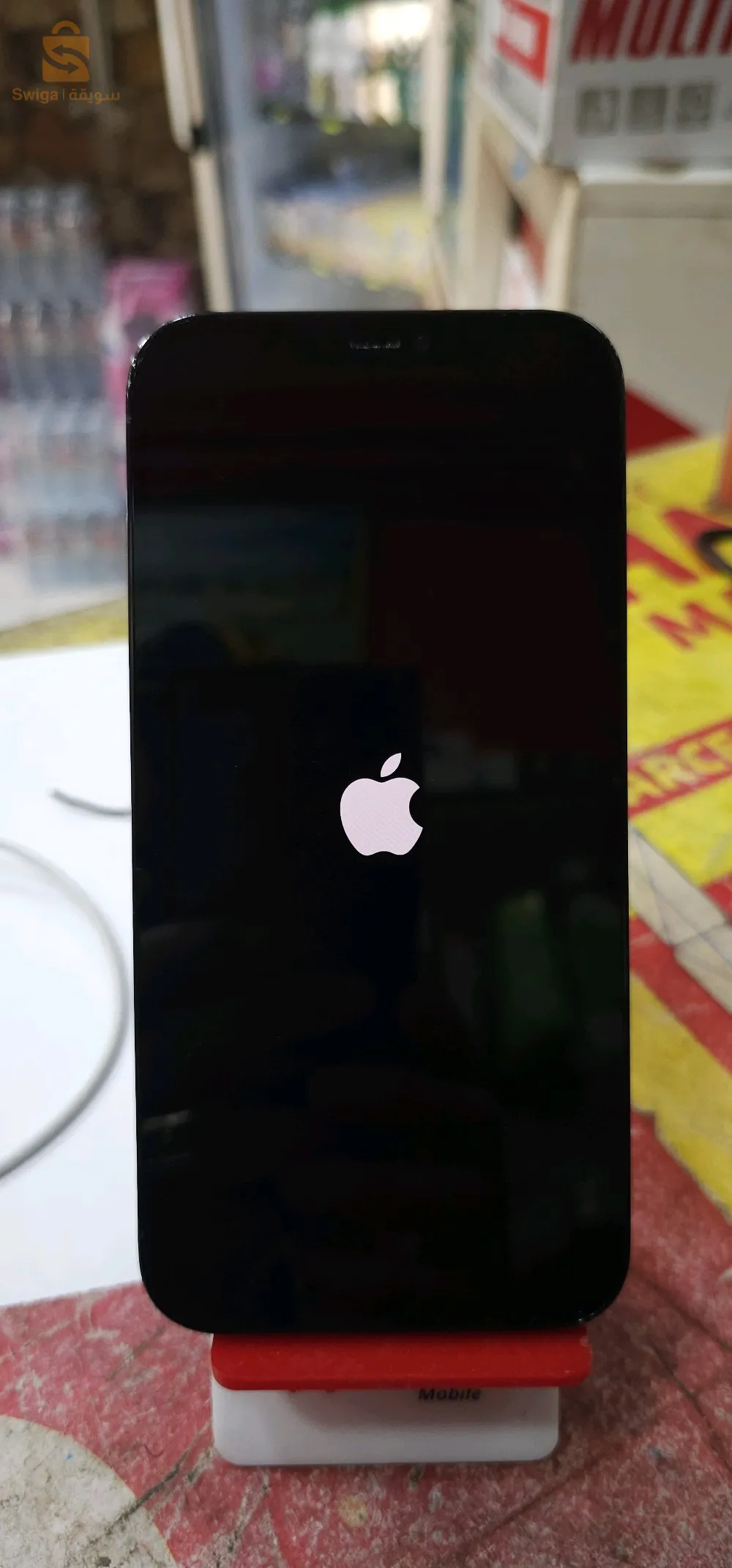 IPhone 12 pro Max 128 batrie 84 Très bon état 
2 puces koulchi marche avec chargeur Original