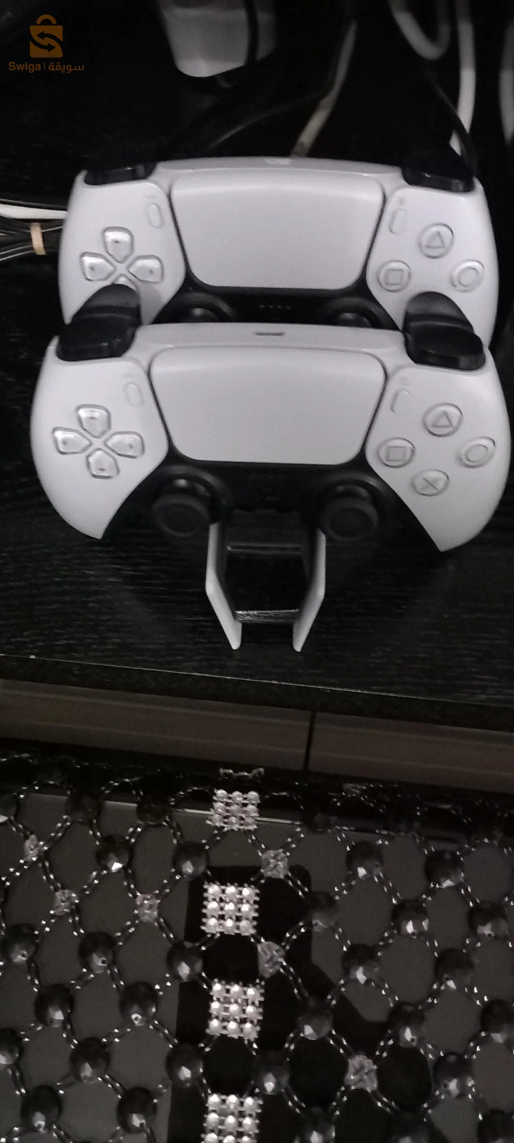 ps5 jdid utilise 2 mois avec 2 manet et station de charge