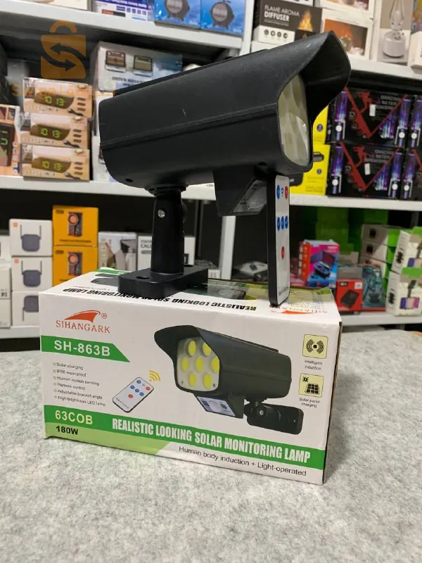 كشاف حائط يعمل بالطاقة الشمسية على شكل كاميرا مزود بمستشعر للحركة وجهاز تحكم عن بعد JLP-2178$👍