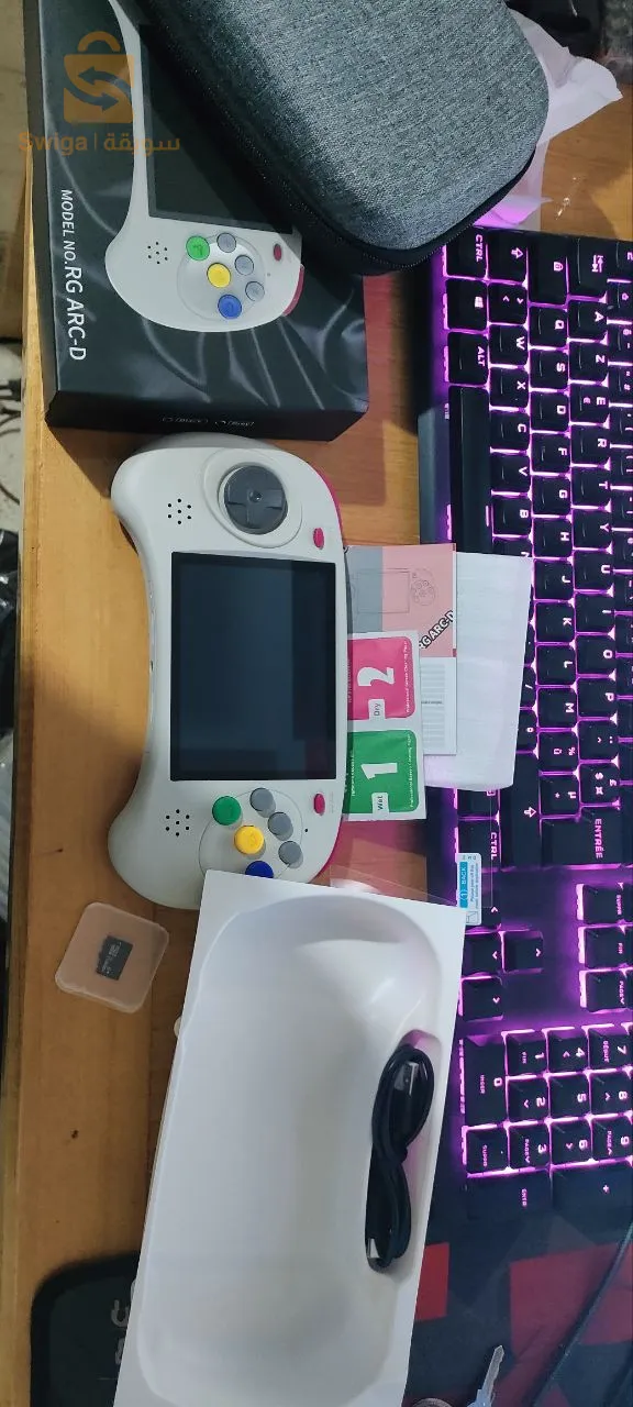 استمتع بتجربة الألعاب المحمولة بلا حدود مع ANBERNIC RG ARC-D! 🎮✨جديد تماما مع التوصيل لجميع الولايات