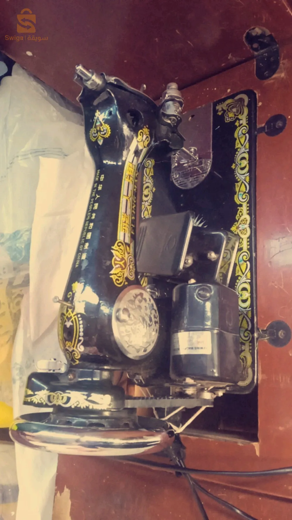 آلة خياطة مستعملة