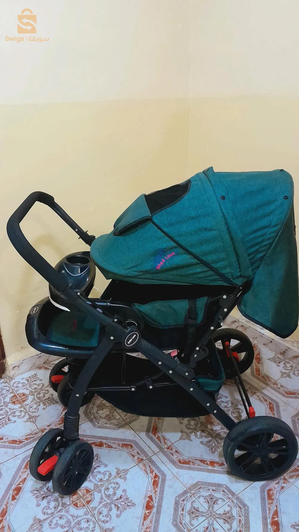 عربة أطفال بسعر الزوالي