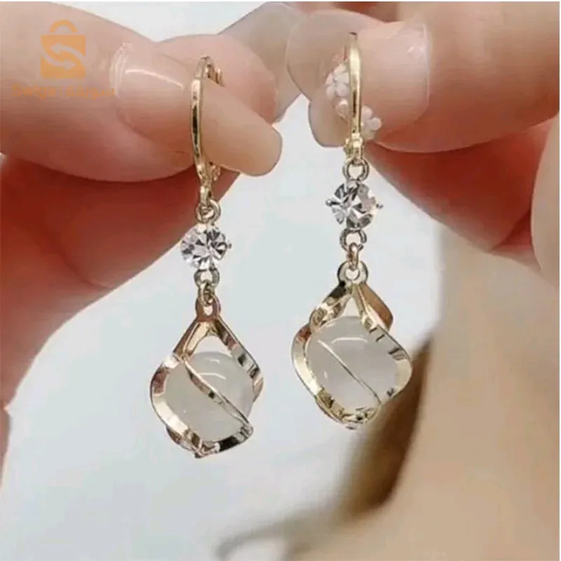 Boucle d'oreille perle