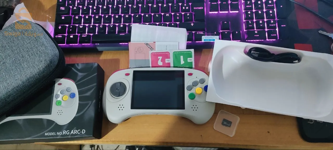 استمتع بتجربة الألعاب المحمولة بلا حدود مع ANBERNIC RG ARC-D! 🎮✨جديد تماما مع التوصيل لجميع الولايات