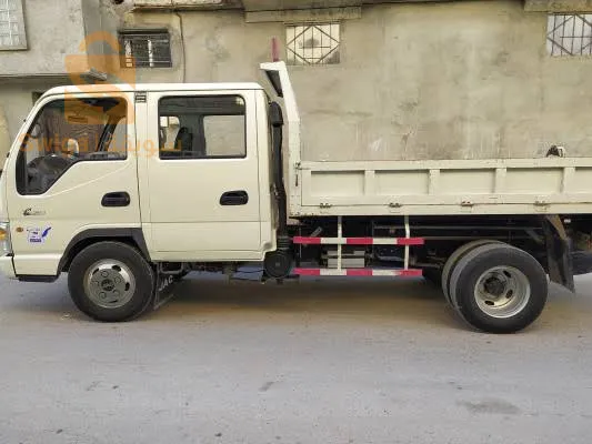 نقل السلع و البضائع والخشب و مواد البناء و الرمال