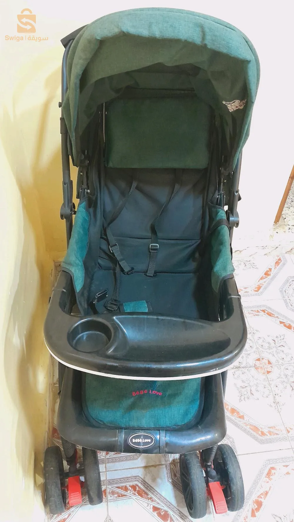 عربة أطفال بسعر الزوالي