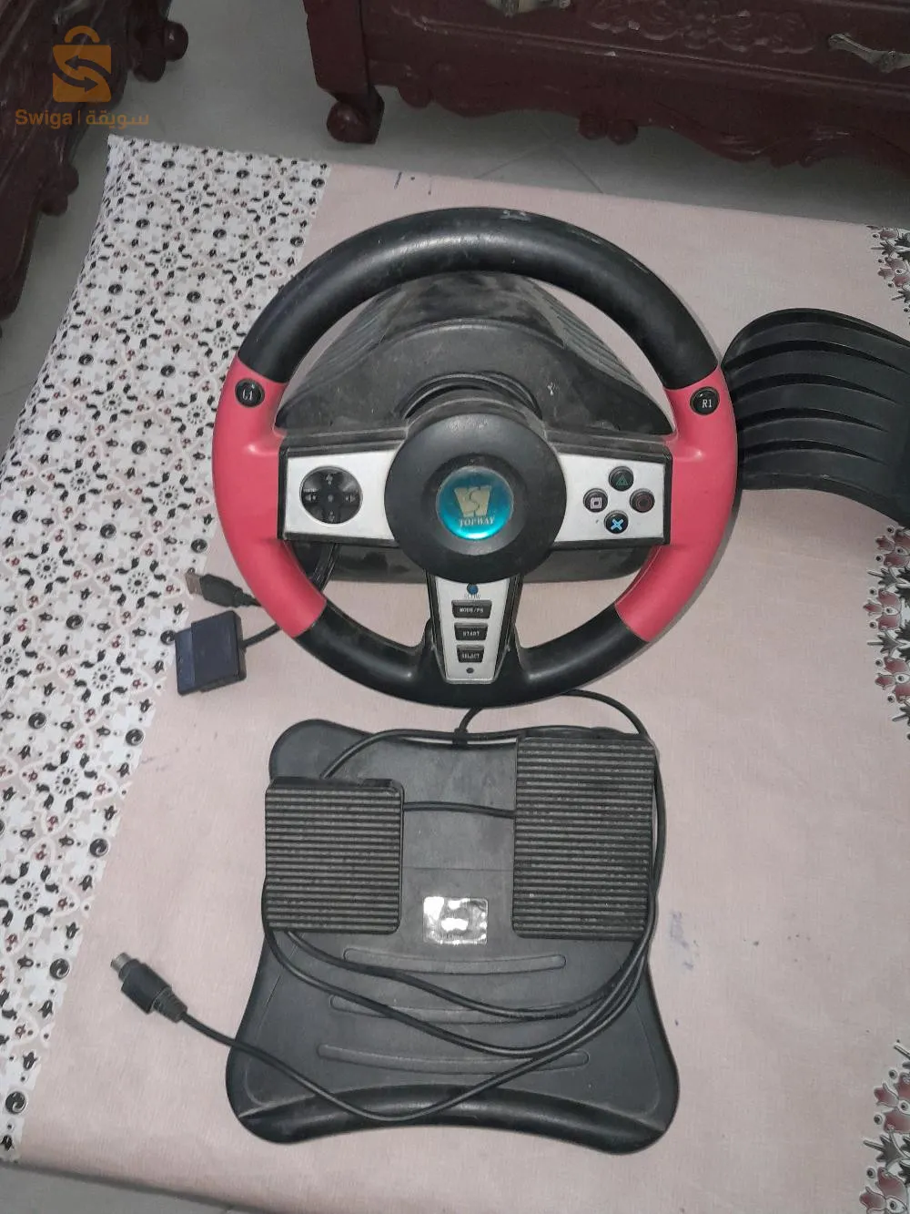 volant pour les jeux les voitures.. PC ou PlayStation