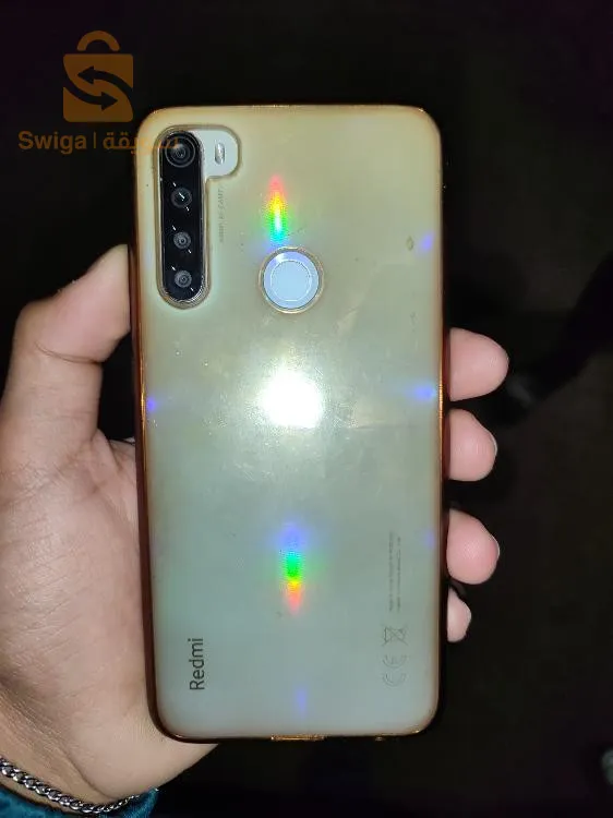 avec la boîte et chargeur