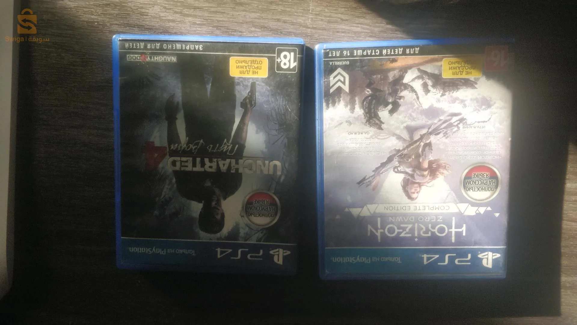 اقراص لعب بلستيشن Uncharted 
ولعبة horizon zoro dawn