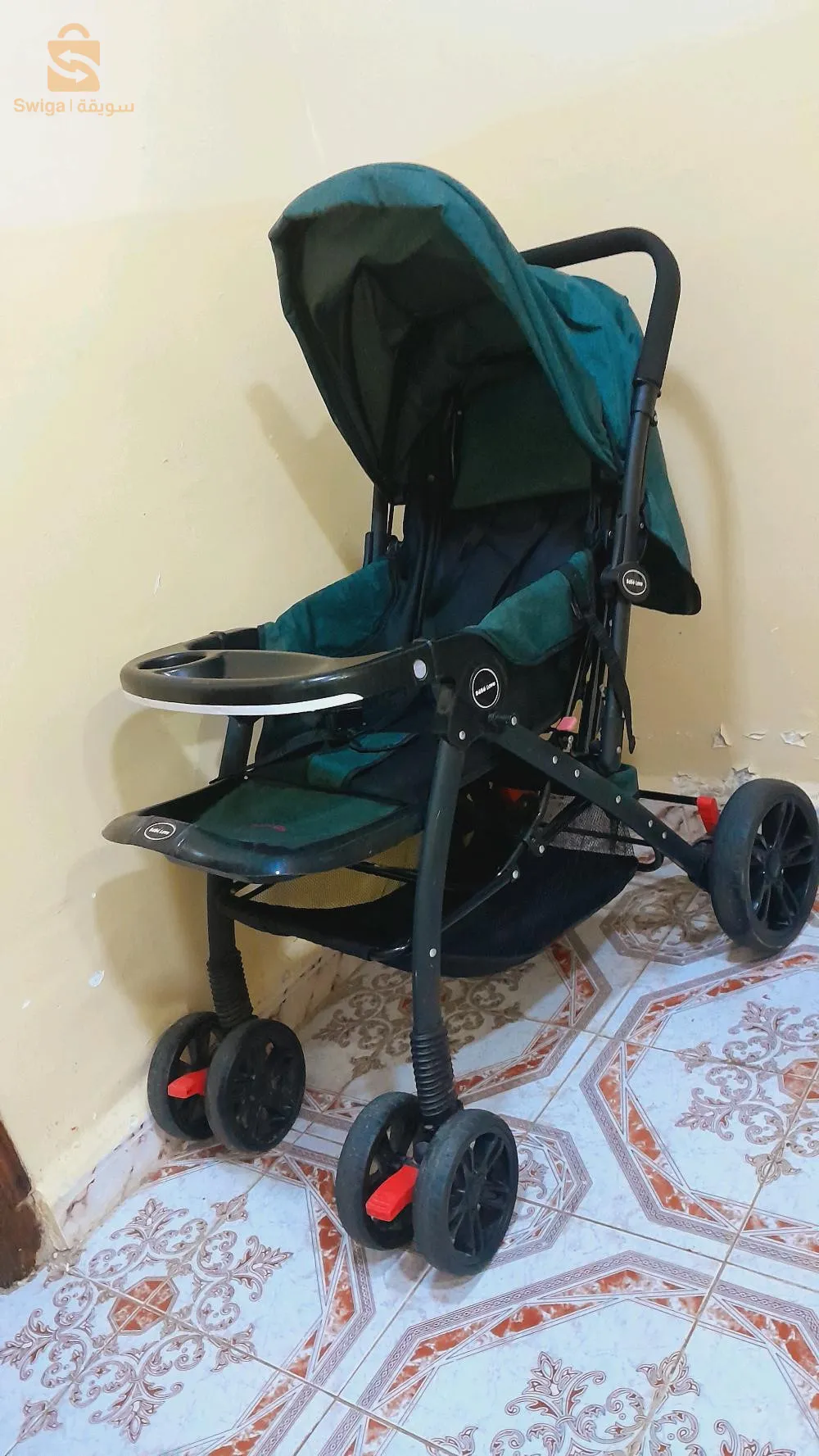 عربة أطفال بسعر الزوالي