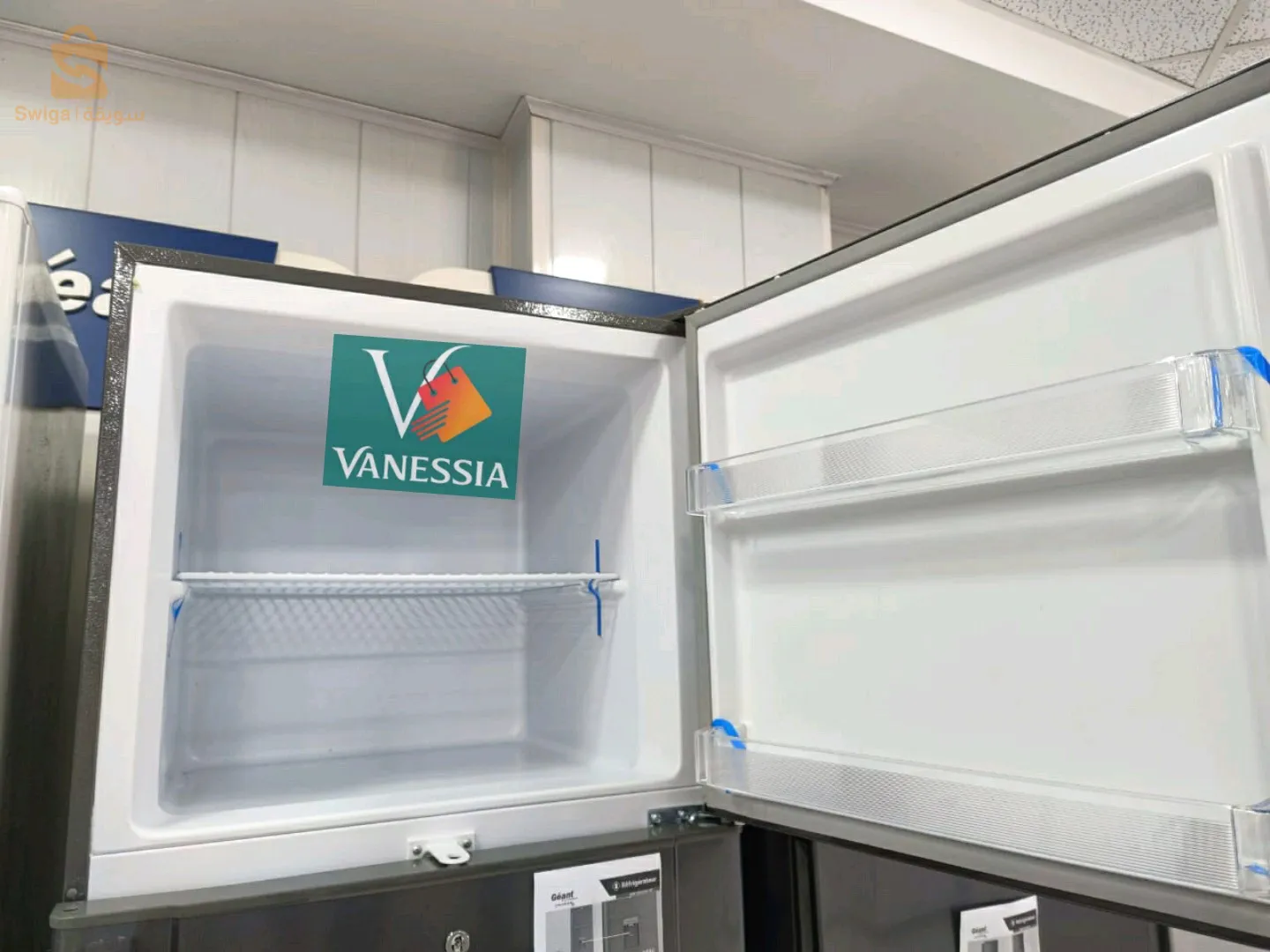 Réfrigérateur marque géant gris